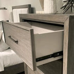 Roundhill Furniture Ennesley Gray Wood Bedroom Set with Upholstered Panel Bed, Dresser, Mirror, Nightstand, and Chest